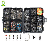 An open black plastic tackle box containing 160 various silver and colored fishing accessories, including hooks, swivels, sinkers, snaps, and beads, neatly organized in separate compartments. Individual examples of a swivel with a snap, a barrel swivel, a three-way swivel, a hook, and a sinker are shown below the box.