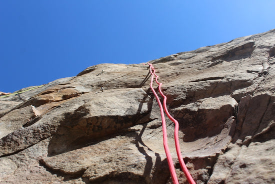 red rope on brown rock