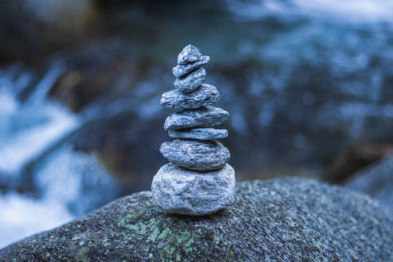 gray stone stack on gray rock