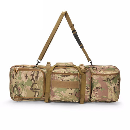 A camouflage tactical carrying case with multiple zippered compartments, carrying handles, and an adjustable shoulder strap laid against a white background.