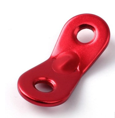 A single bright red ShineTrip mini tent rope buckle is shown angled against a white background. The buckle has two holes for threading rope and a curved design for easy adjustment. The ShineTrip logo is visible in the upper left corner of the image.