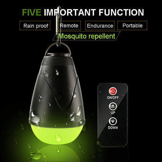 A small, black, teardrop-shaped LED camping light hangs from a silver carabiner clip against a dark background. To the right is a small black remote control with a power button, up and down arrows, and a green light indicator. Water droplets are depicted falling on the light, indicating rainproof capability. Text at the top indicates "FIVE IMPORTANT FUNCTION" with icons for "Rain proof," "Remote," "Endurance," "Portable," and "Mosquito repellent."