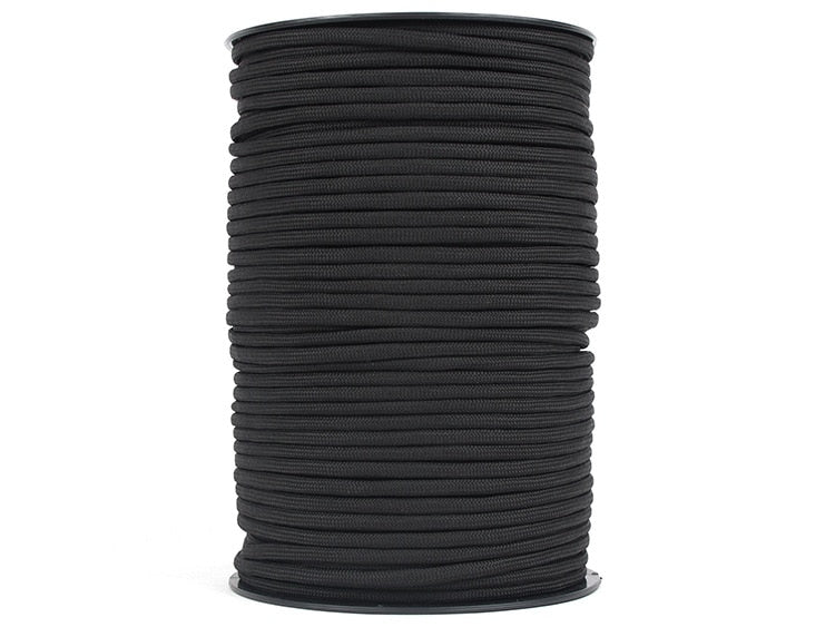 A large spool of black 100-meter 550 military standard 9-core paracord rope.