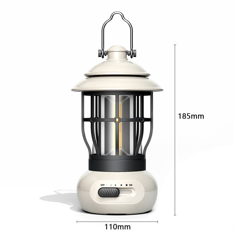 A vintage-style camping lantern with a white top and base, and a black protective cage around a cylindrical light source. A silver carrying handle extends from the top. To the right and below, dimensions "185mm" (height) and "110mm" (base diameter) are indicated. A slider switch on the base shows "OFF" and "ON" positions.