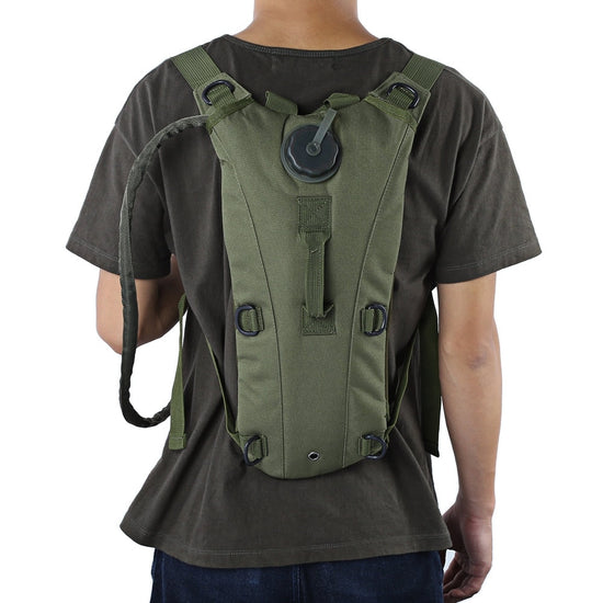 A person wearing a camouflage 3L tactical hydration backpack with a drinking hose, showing the backpack&