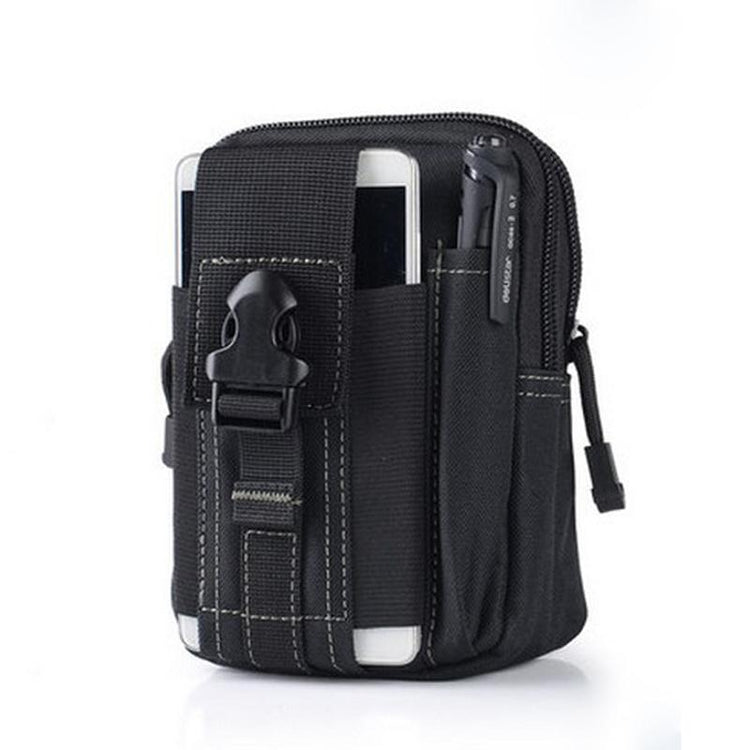 A black tactical waist bag with multiple pockets and straps is shown against a white background. A white smartphone is partially visible in an outer pocket, and a black pen is in a side loop. A black buckle closure is visible on the main flap.