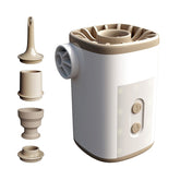 A white and tan portable electric air pump is shown with four detachable nozzles of varying shapes and sizes arranged to its left. The pump has a cylindrical body with a fan outlet on the side and two buttons on the front. The top of the pump has a tan circular vent.