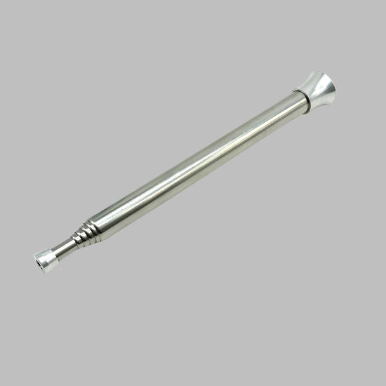 A telescopic fire tube, shown both collapsed and extended, made of stainless steel, highlighting its compact design and functionality for starting fires.