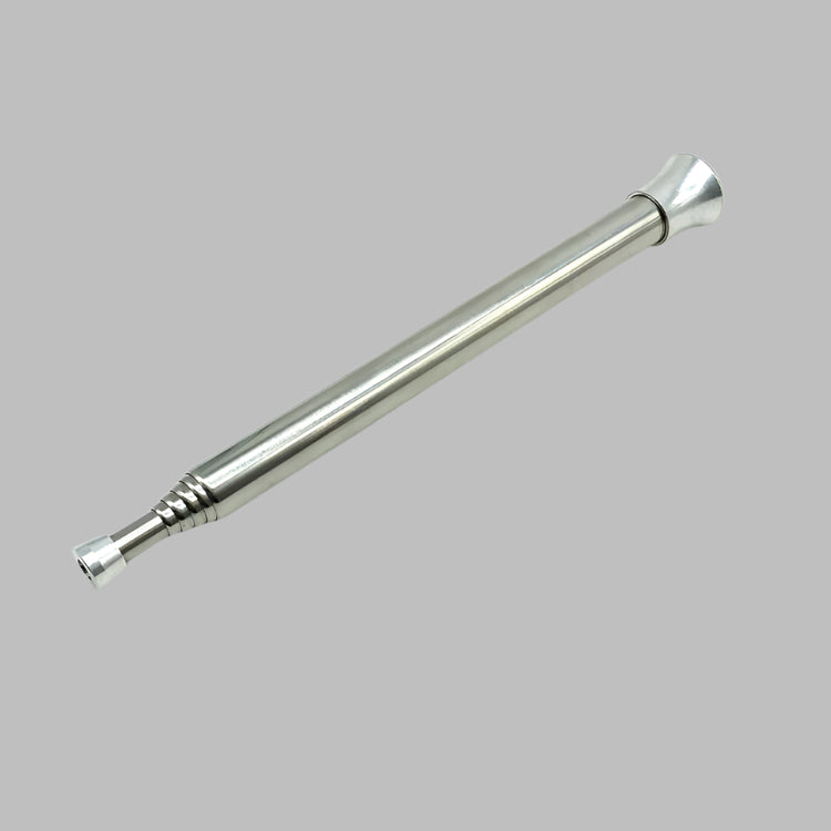 A telescopic fire tube, shown both collapsed and extended, made of stainless steel, highlighting its compact design and functionality for starting fires.