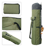 A green nylon two-layer fishing rod bag, shown both empty and folded, with close-ups of the carrying strap and zipper details. A fishing rod with a reel is partially visible inside the standing bag.