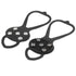 A pair of black rubber anti-slip ice grippers for shoes, one showing the top with embedded silver spikes and the other showing the underside.