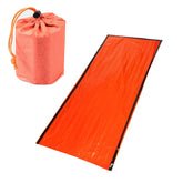 An unfolded orange emergency sleeping bag withAn unfolded orange emergency sleeping bag with black trim is shown next to its compact, drawstring storage bag made of similar orange material. black trim is shown next to its compact, drawstring storage bag made of similar orange material.