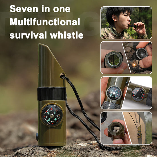 A military green 7-in-1 survival whistle hangs from a black lanyard against a white background. The whistle features a compass, a magnifying lens, a small LED light, and a reflective side.