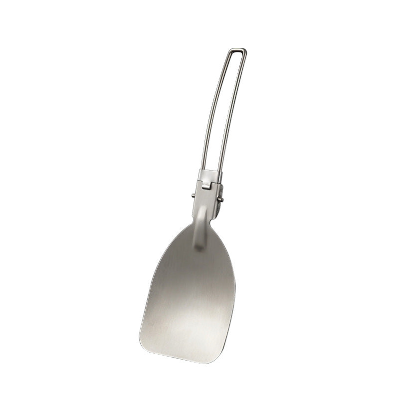 A silver folding spatula made of 304 stainless steel is shown against a white background. The handle is folded down towards the spatula head.