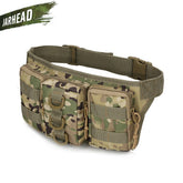 An olive green JARHEAD tactical waist pack with multiple zippered compartments and MOLLE webbing is shown against a white background. The waist strap is visible with a black buckle. A "JARHEAD" logo is visible in the upper left corner of the image.
