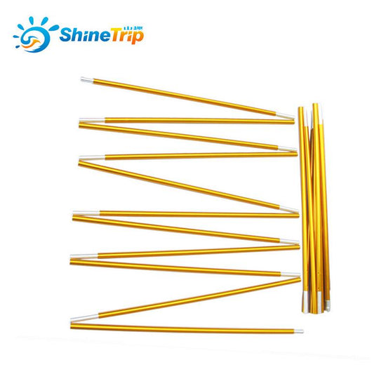 A set of multiple gold-colored aluminum tent pole sections with silver ferrules, arranged on a white background. The "ShineTrip" logo is visible in the upper left corner.
