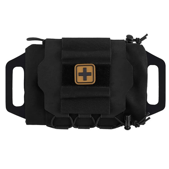 A black tactical first-aid pouch with MOLLE webbing and a Velcro patch featuring a tan medical cross is shown against a white background. The pouch has side loops for belt mounting and pull tabs for quick opening