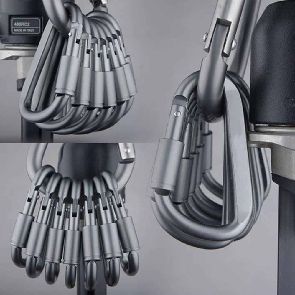 A collage of three images shows multiple silver D-ring carabiner clips attached to a larger silver carabiner. The carabiners are shown in various orientations, highlighting their shape and attachment mechanism.