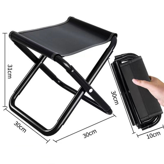A black folding stool with a black Oxford cloth seat is shown with dimension lines indicating its size when unfolded and a hand folding a similar stool to a compact size. Text at the bottom indicates "Thickened steel with a load capacity of 100kg".