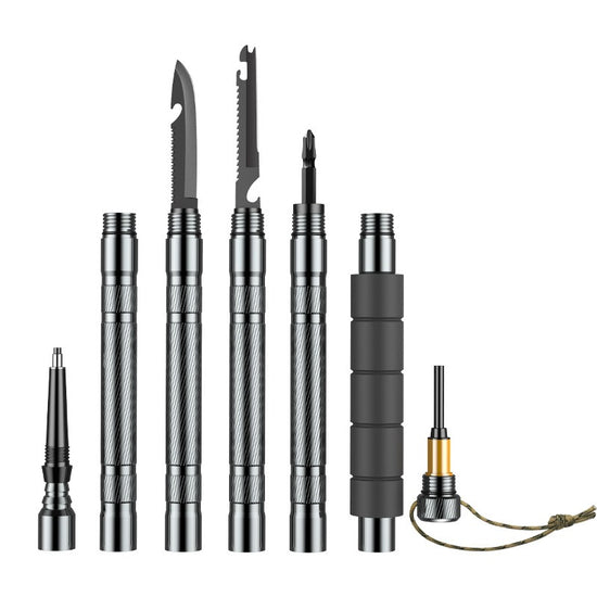 Several disassembled sections of a silver and black folding hiking stick are shown against a white background. The sections include a pointed tip, segmented shaft, a handle with a screwdriver bit attachment, and various screwdriver bits.