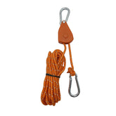 An orange reflective tent guy line with a black pulley mechanism and silver carabiner clips is shown against a white background. The rope is coiled and secured with a black band.