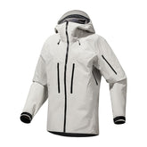 A light gray hard shell jacket with a hood, a front zipper, and vertical zippered pockets on the chest.