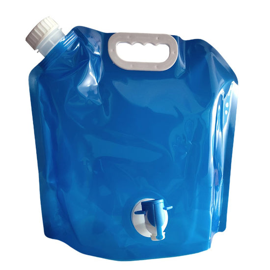 A blue foldable water container bag with a white screw-top opening on the top left, a white carrying handle on the top, and a white and blue dispensing faucet on the lower front.