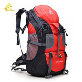 A red and black Free Knight 50L backpack with adjustable straps, mesh side pockets, and the "Adventure 50L" logo visible on the lower front. The "FREE KNIGHT" logo is visible in the upper left corner.