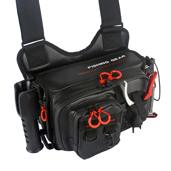 A black waterproof fishing tackle bag with multiple zippered compartments, orange zipper pulls, and adjustable black straps. "FISHING GEAR" is printed on the top flap.