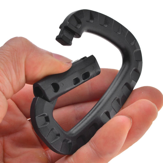  A single black, non-locking D-ring carabiner with a textured surface is shown angled slightly against a white background.